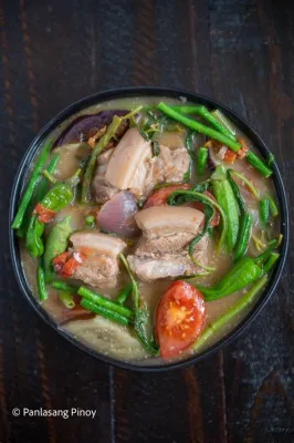 Sinigang na Lechon! A Tangy and Refreshing Symphony of Pork and Sourness