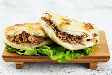  Weinan Roujiamo: En Savsam Kebab Inbäddad I Den Mjukaste Gua Bao!